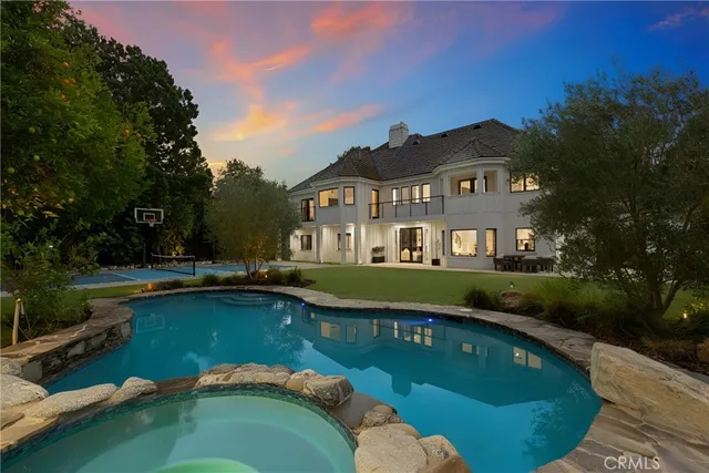 a view of a house with a swimming pool