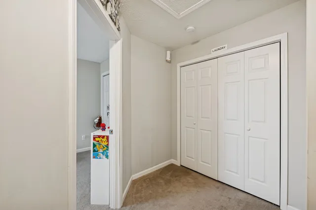 a kitchen with stainless steel appliances granite countertop a stove and a refrigerator