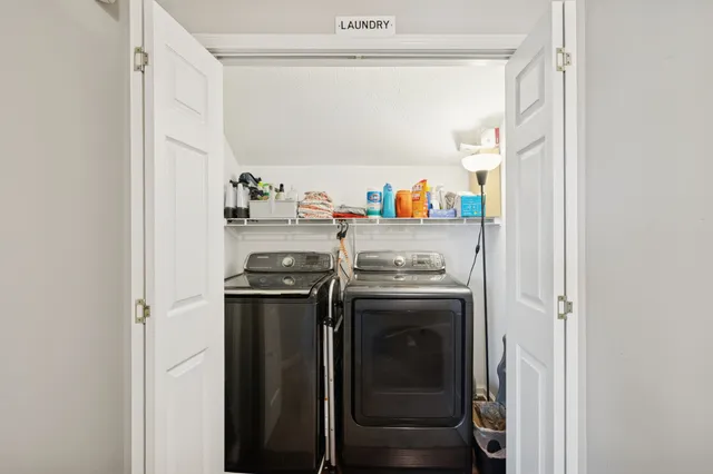 a backyard of a house with outdoor seating