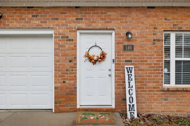 a front view of a house with an outdoor space