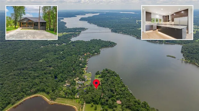 an aerial view of a house with outdoor space
