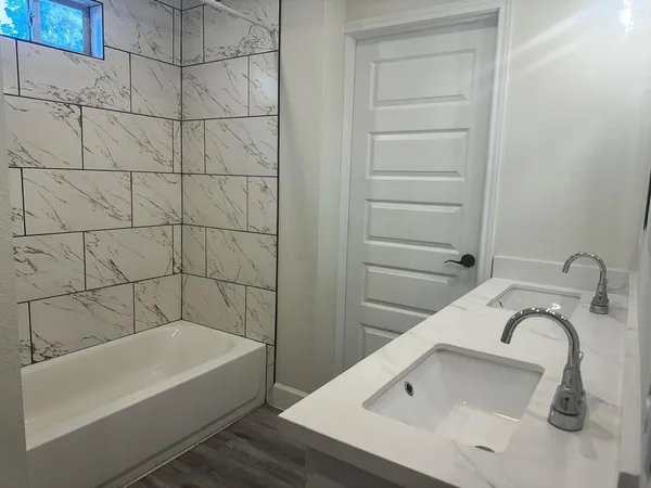 a view of wooden floor in an empty room
