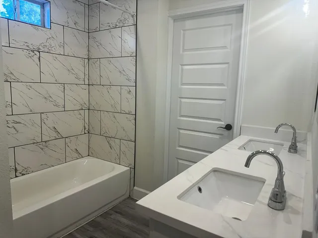 a view of wooden floor in an empty room