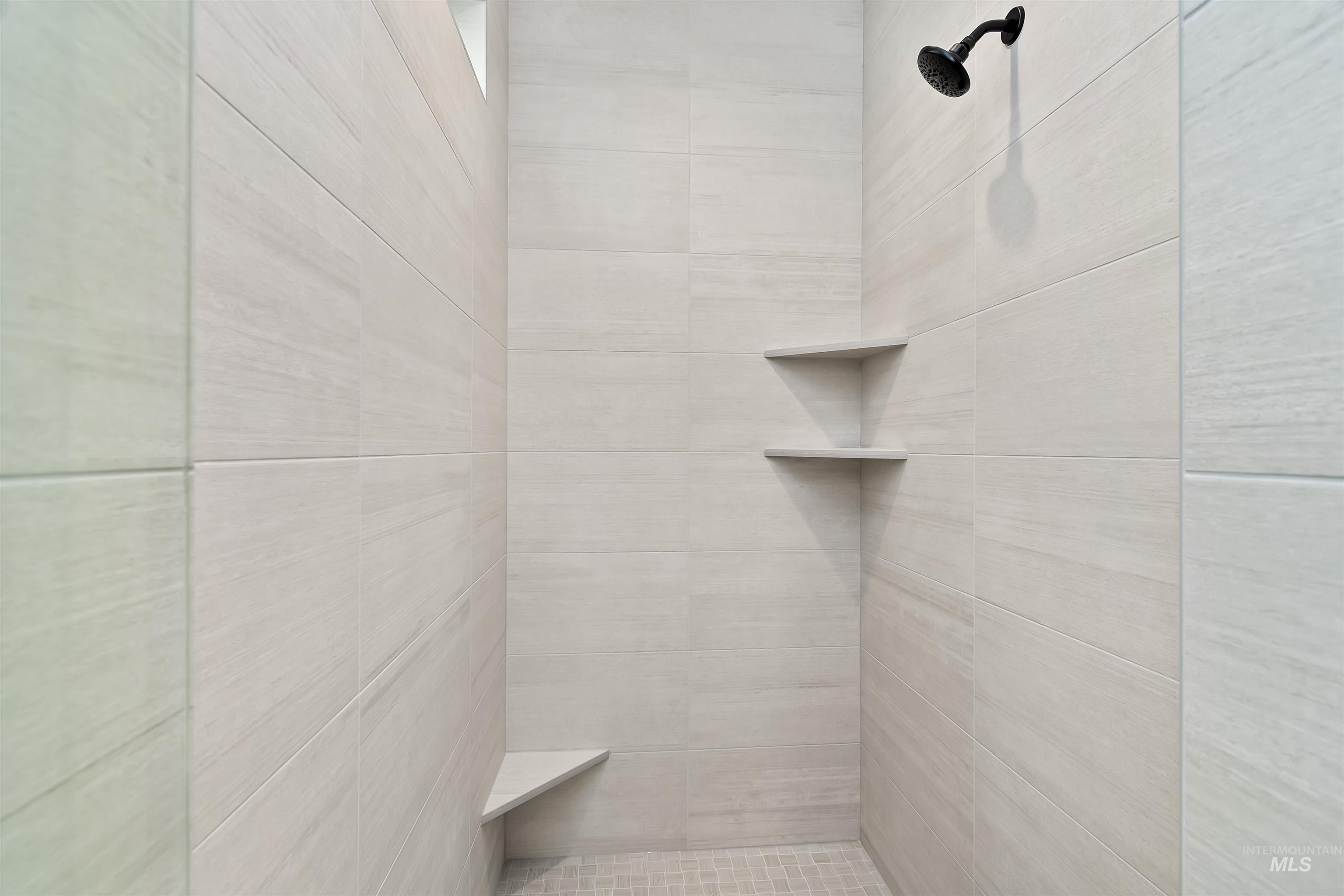 3875 South Corabell Avenue Meridian, ID 83642 - Photo 15 of 27 Bathroom view of tiled shower