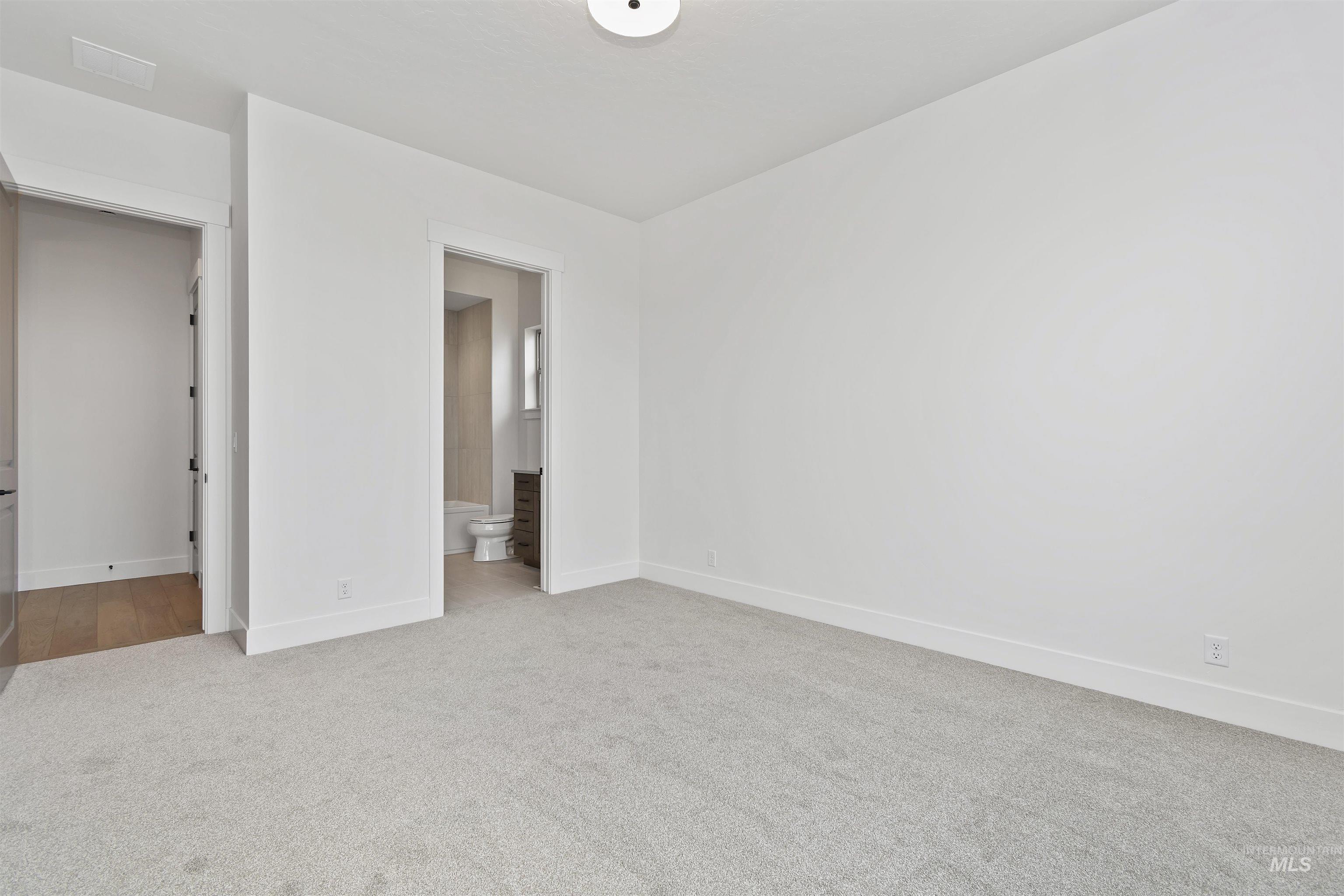 3875 South Corabell Avenue Meridian, ID 83642 - Photo 19 of 27 Ensuite guest bedroom