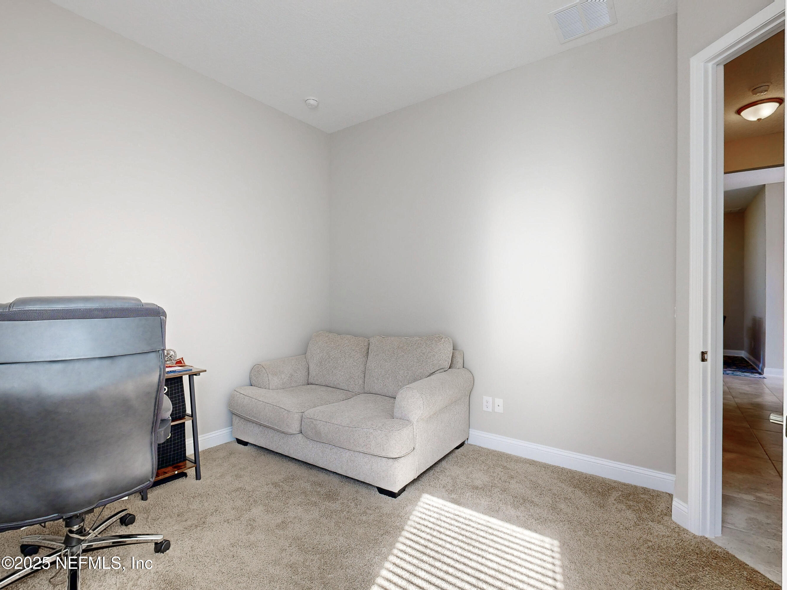 158 Holly Rdg Way St. Augustine, FL 32092 - Photo 21 of 46 a living room with furniture and a couch