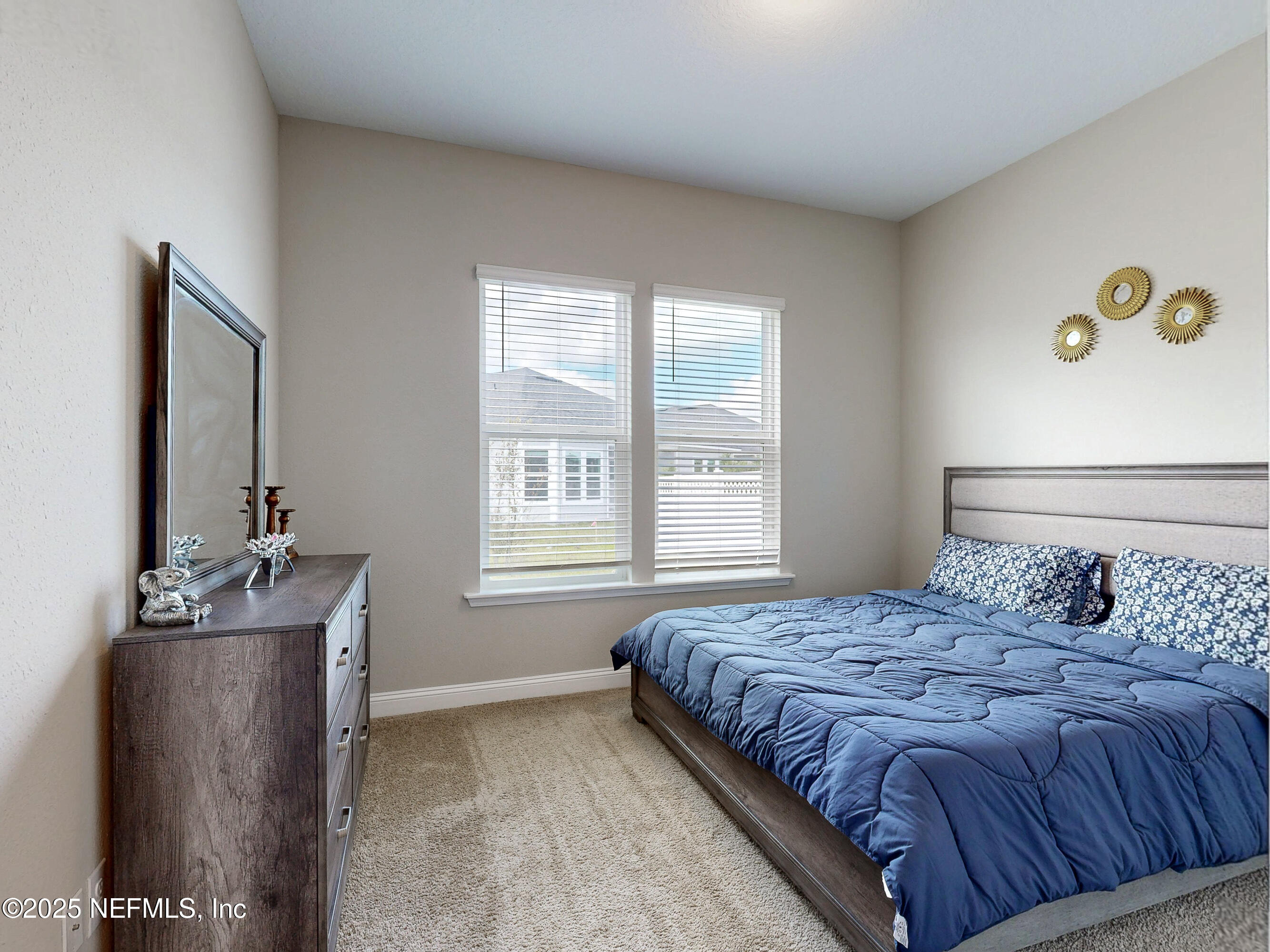 158 Holly Rdg Way St. Augustine, FL 32092 - Photo 25 of 46 a bedroom with a bed and a window