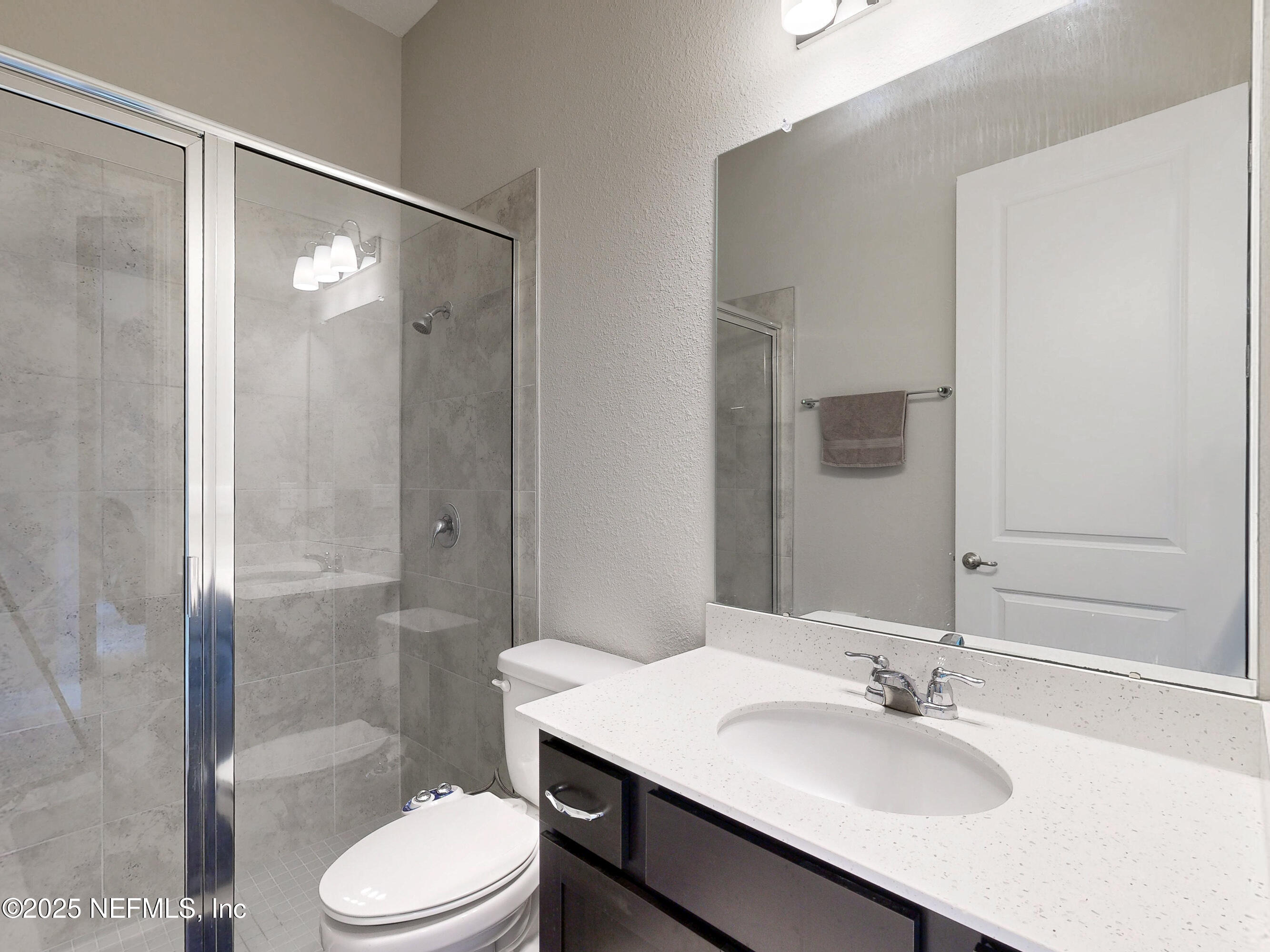 158 Holly Rdg Way St. Augustine, FL 32092 - Photo 28 of 46 a bathroom with a sink toilet and shower