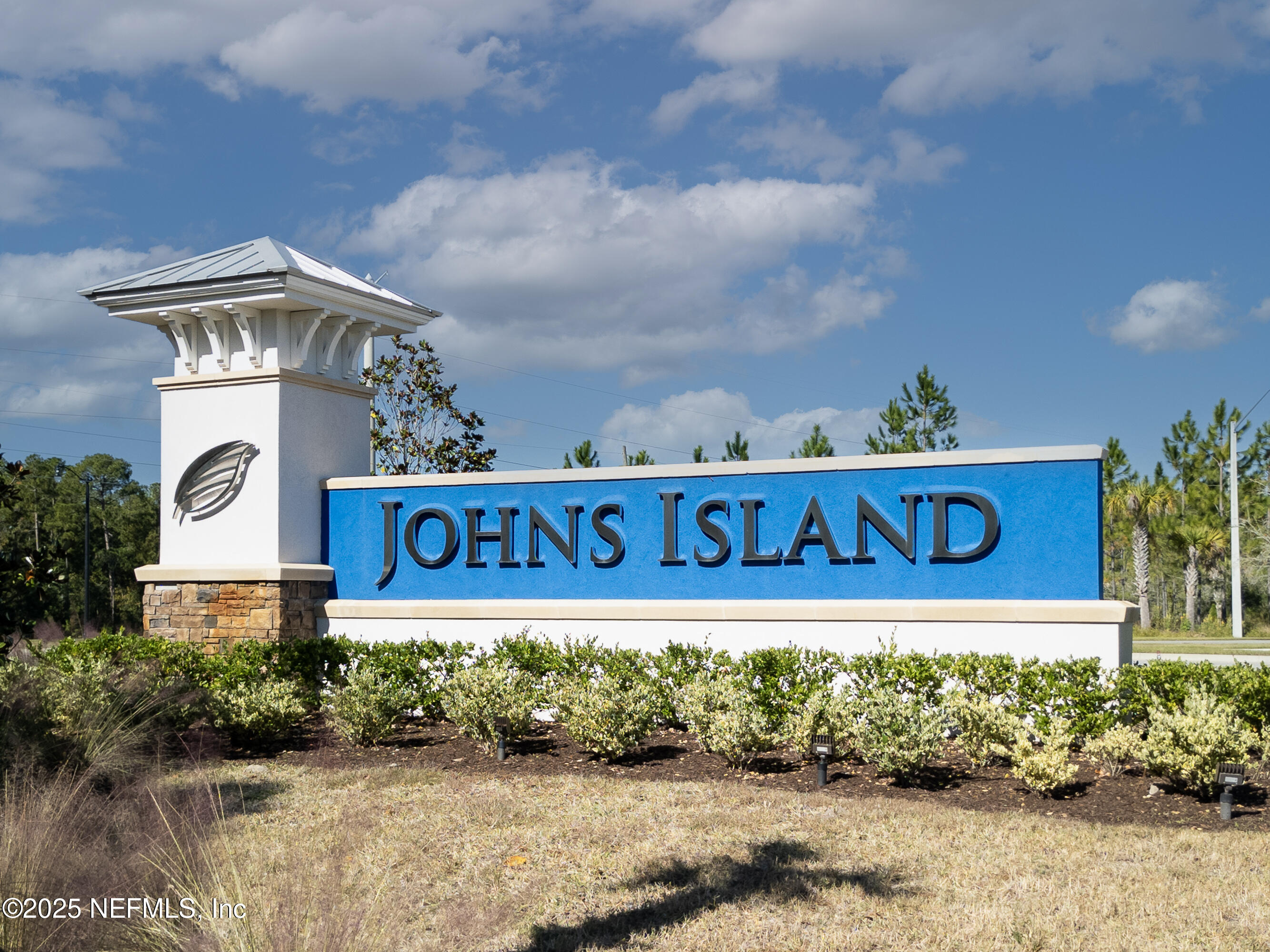158 Holly Rdg Way St. Augustine, FL 32092 - Photo 41 of 46 a street sign that is on a wooden wall