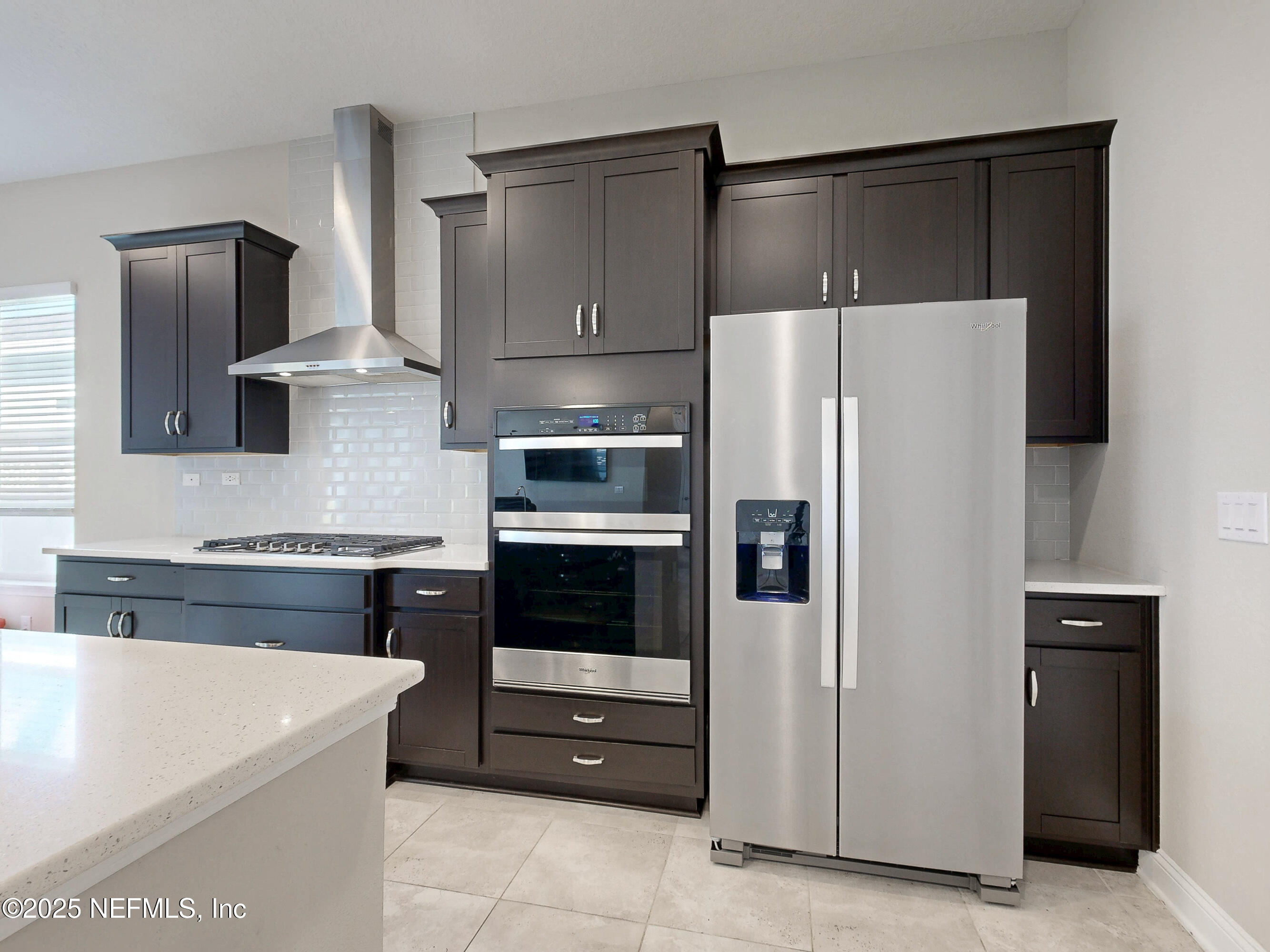158 Holly Rdg Way St. Augustine, FL 32092 - Photo 5 of 46 a kitchen with stainless steel appliances a refrigerator stove and sink