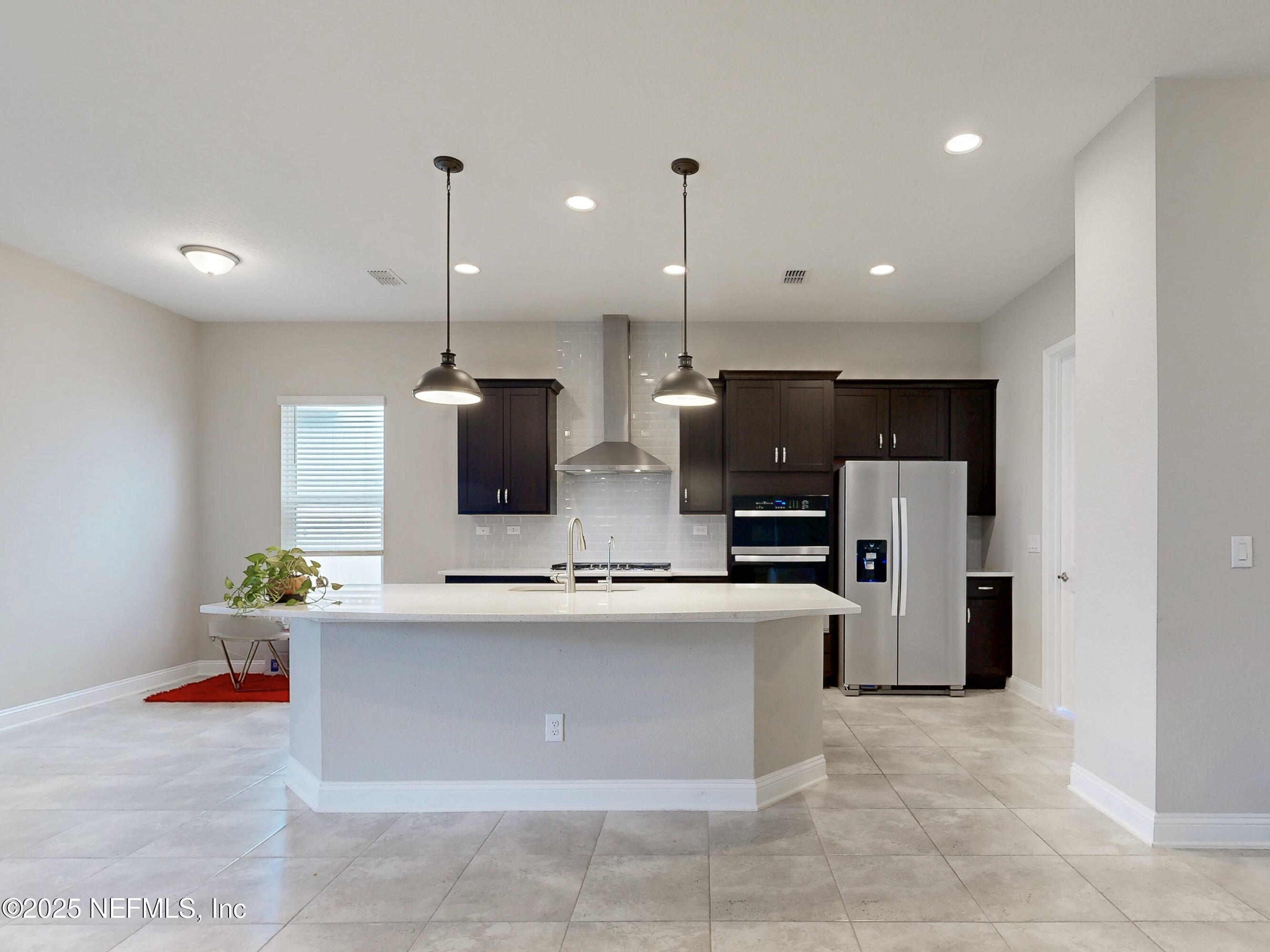 158 Holly Rdg Way St. Augustine, FL 32092 - Photo 6 of 46 a large kitchen with stainless steel appliances lots of counter space