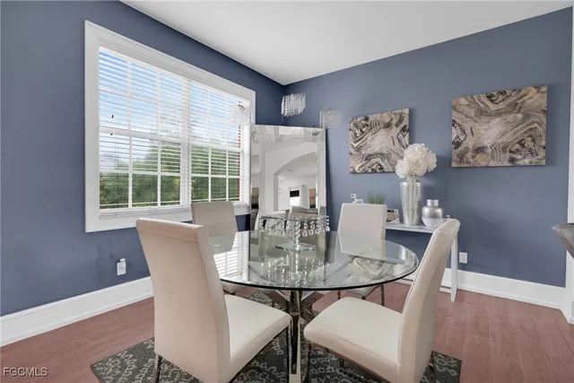 a kitchen with stainless steel appliances a refrigerator and a stove top oven