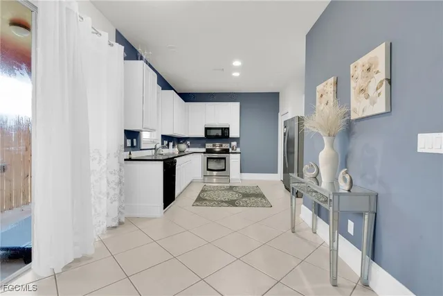 a bedroom with a bed and a desk