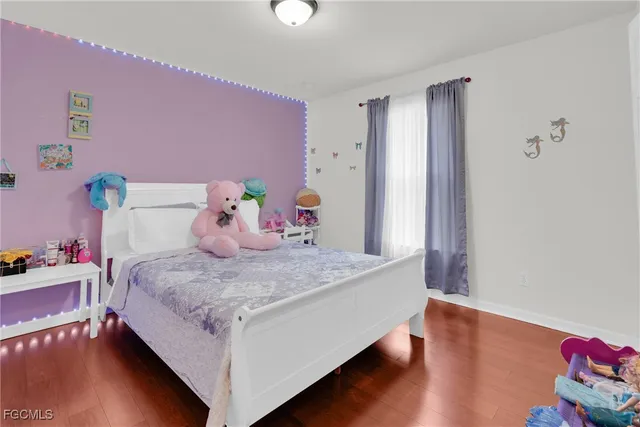 a bathroom with a double vanity sink and mirror