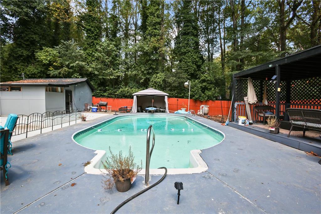 2763 Hayden Drive Atlanta, GA 30344 - Photo 8 of 11 an outdoor sitting area with chairs