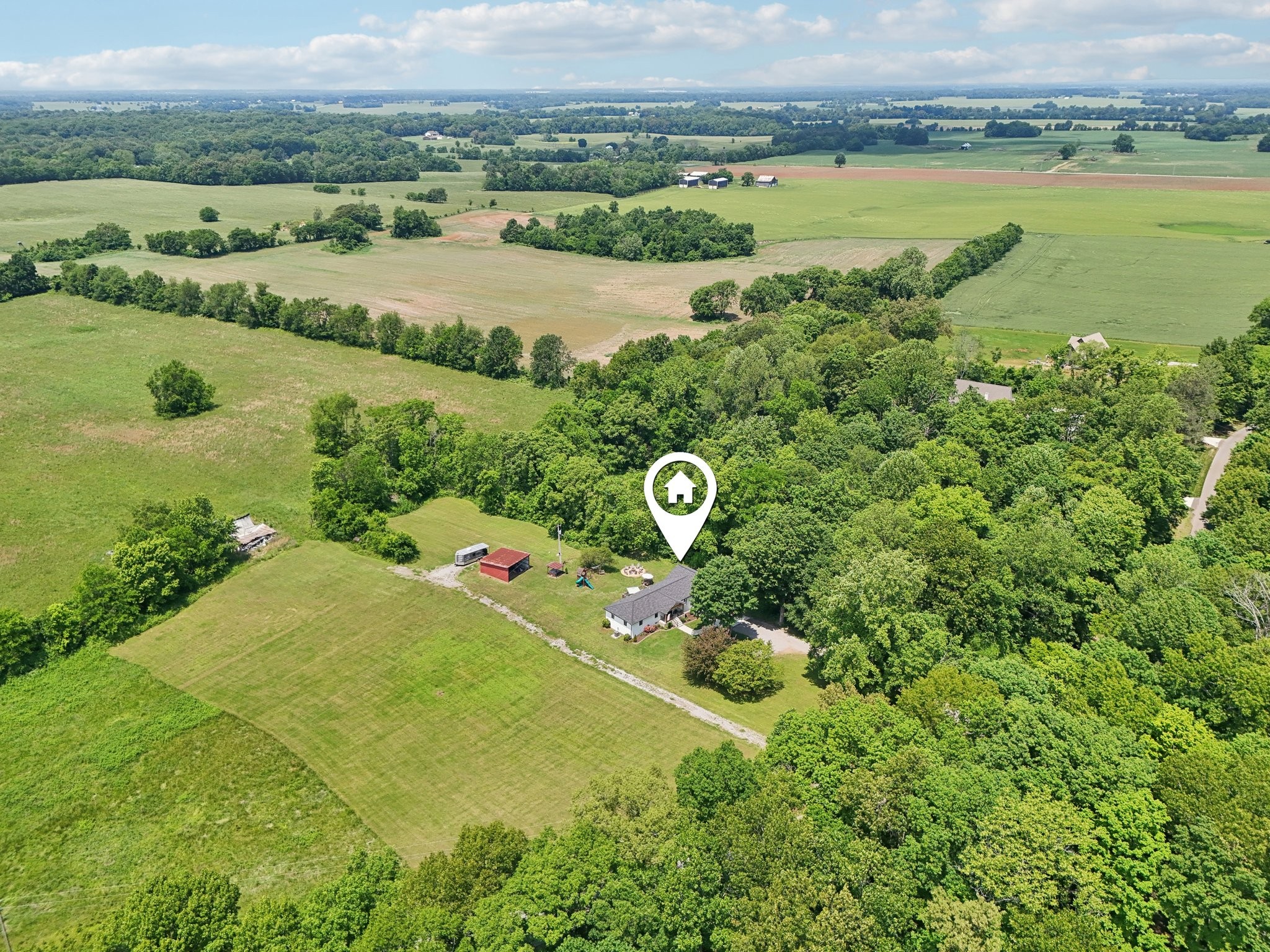 4151 Sadlersville Road Adams, TN 37010 - Photo 2 of 64 an aerial view of a residential houses with outdoor space and lake view
