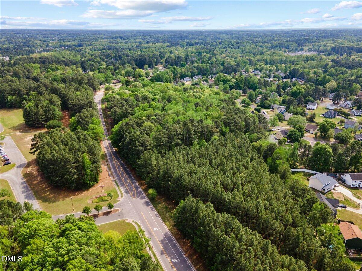 631-633 Clayton Road Durham, NC 27703 - Photo 10 of 17 a view of a city with lush green forest