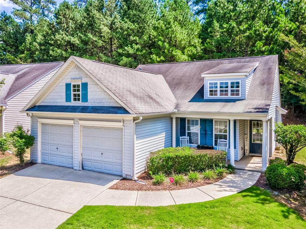 front view of a house with a yard