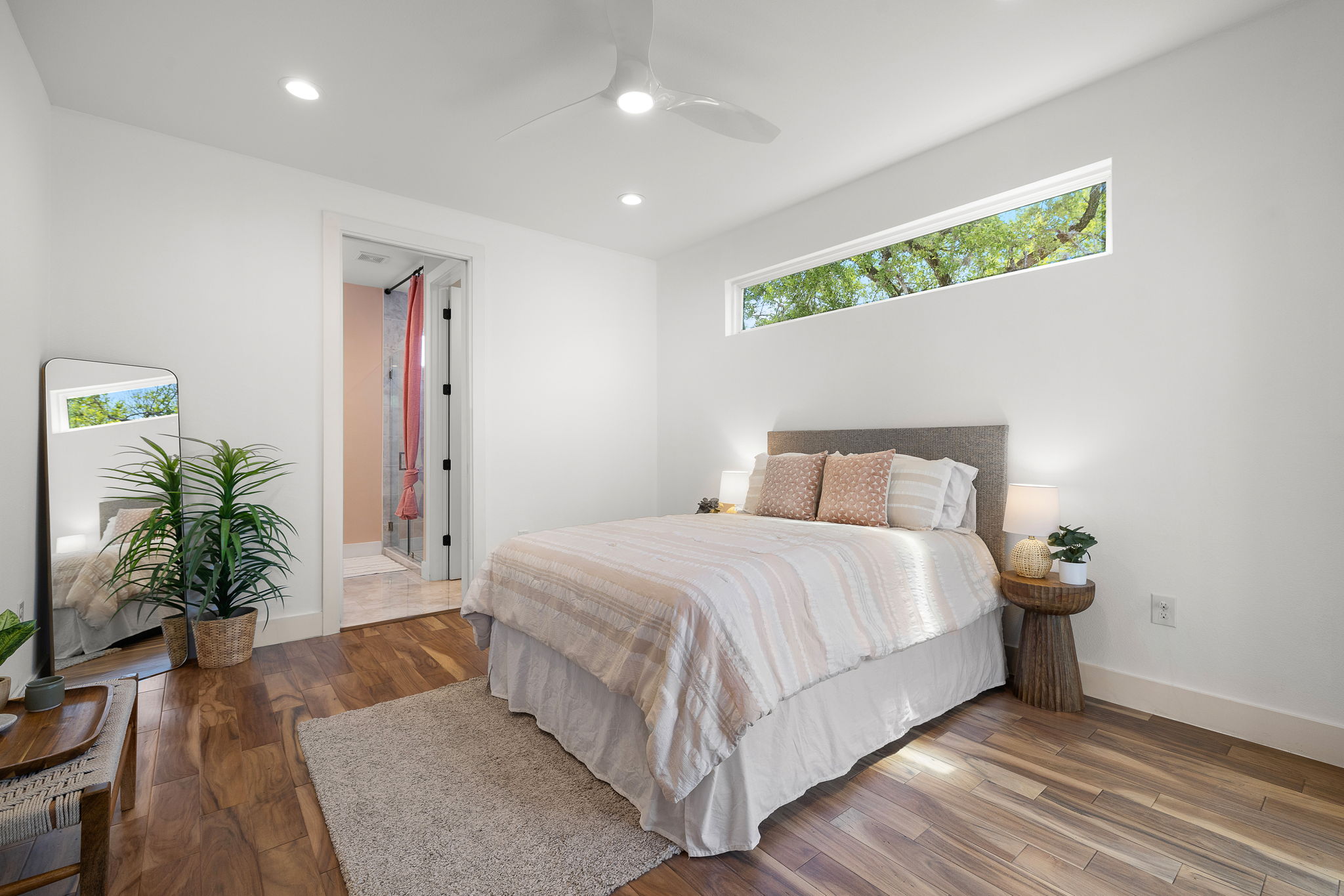 1201 Luna Street Austin, TX 78721 - Photo 15 of 31 Bedroom with hardwood / wood-style floors, recessed lighting, ensuite bath, and a ceiling fan