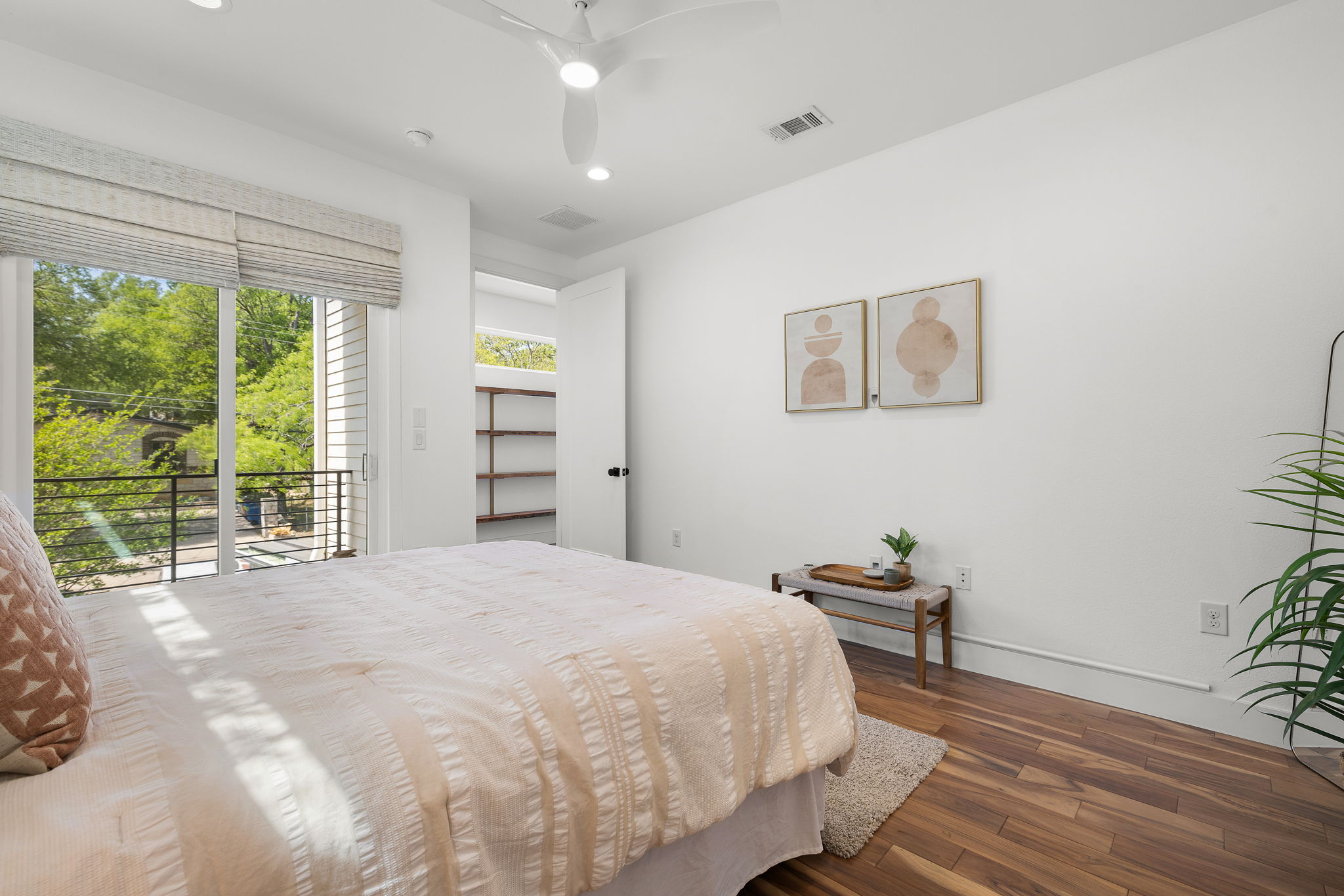 1201 Luna Street Austin, TX 78721 - Photo 17 of 31 Bedroom with recessed lighting, access to outside, wood finished floors, and ceiling fan