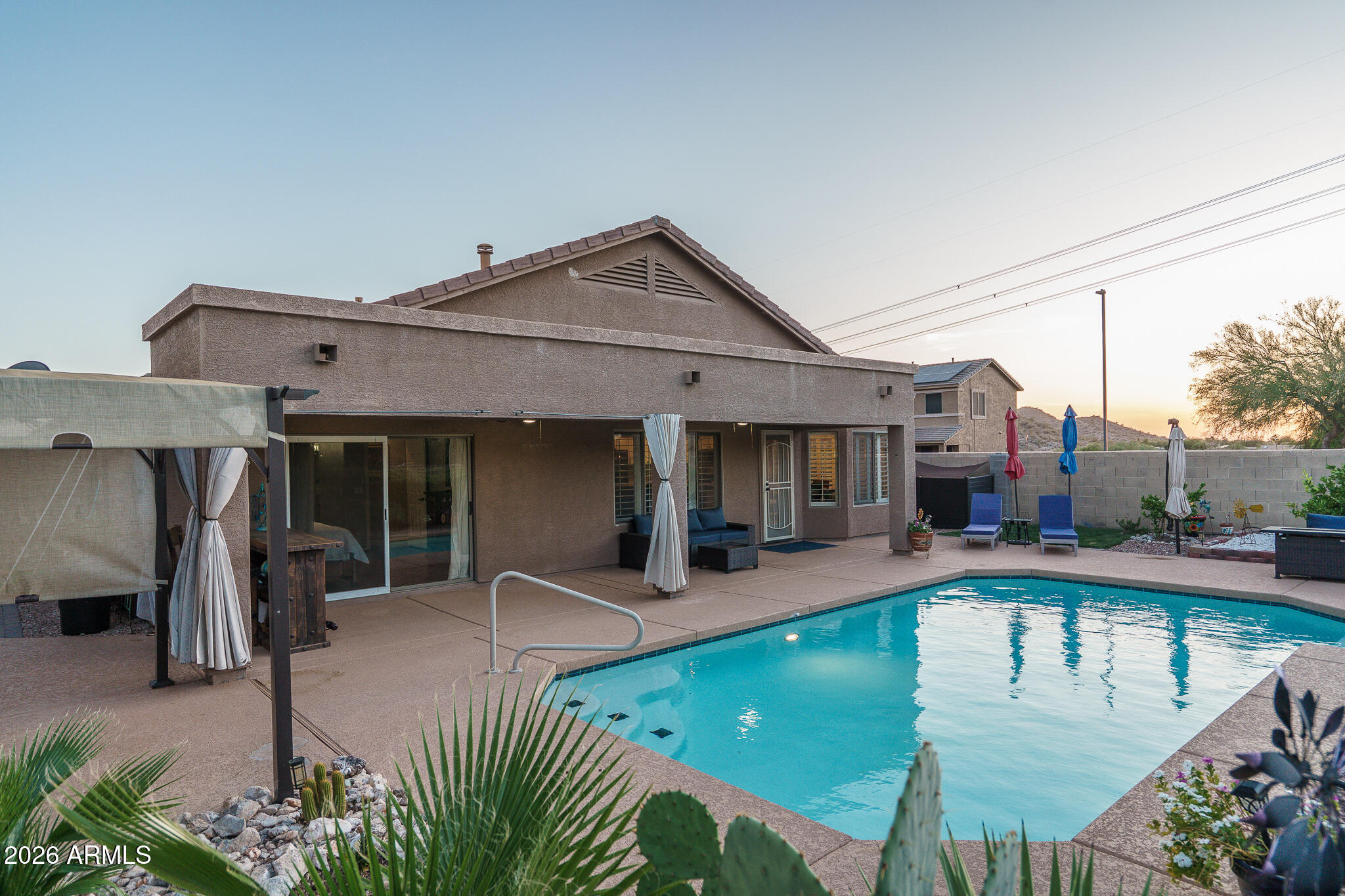 17542 West Rock Ledge Road Goodyear, AZ 85338 - Photo 23 of 66 23) BACK OF HOME