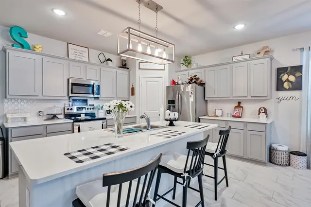 a view of a dining room with furniture