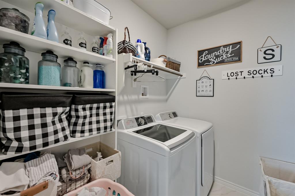 10621 Alpine Meadow Lane Fort Worth, TX 76140 - Photo 23 of 35 a utility room with dryer and washer