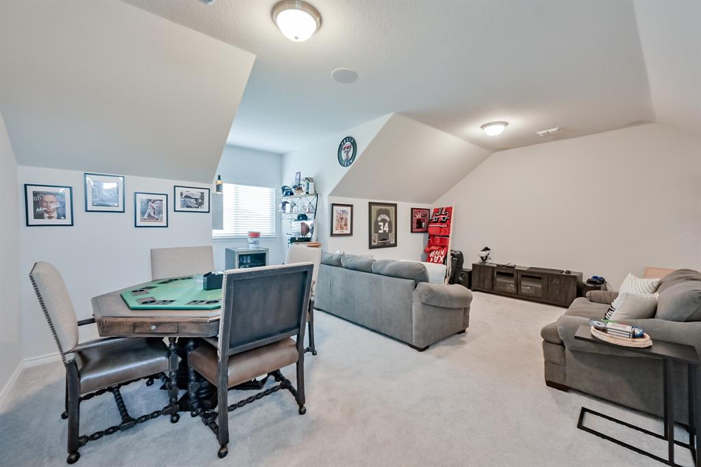 10621 Alpine Meadow Lane Fort Worth, TX 76140 - Photo 29 of 35 a living room with furniture and a wooden floor