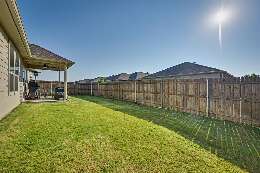 10621 Alpine Meadow Lane Fort Worth, TX 76140 - Photo 35 of 35 a view of backyard with green space