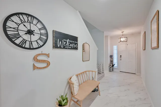 a view of a hallway with elevator