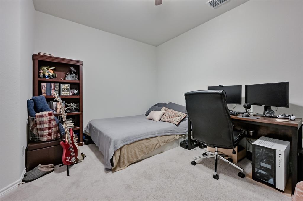 10621 Alpine Meadow Lane Fort Worth, TX 76140 - Photo 7 of 35 a bedroom with a workspace