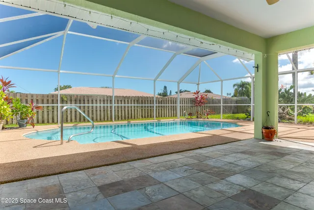 a view of a room with wooden fence