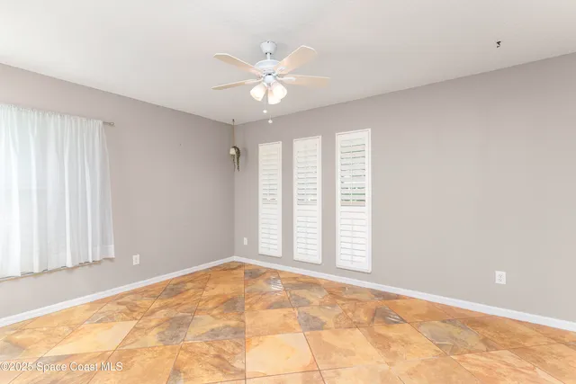 a kitchen with stainless steel appliances granite countertop a sink and a stove