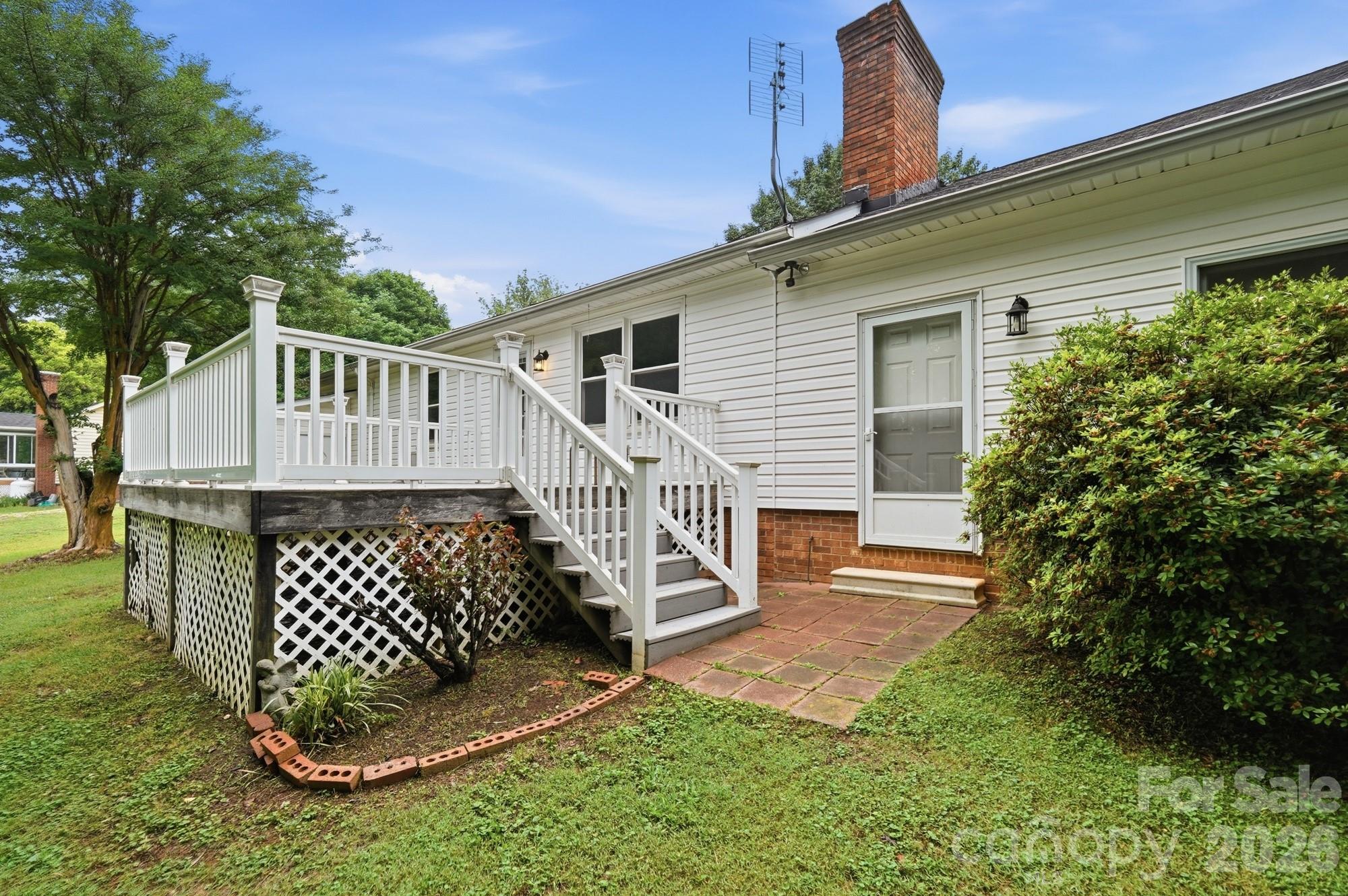 1235 Winecoff School Road Concord, NC 28027 - Photo 26 of 27 a view of a house with a deck