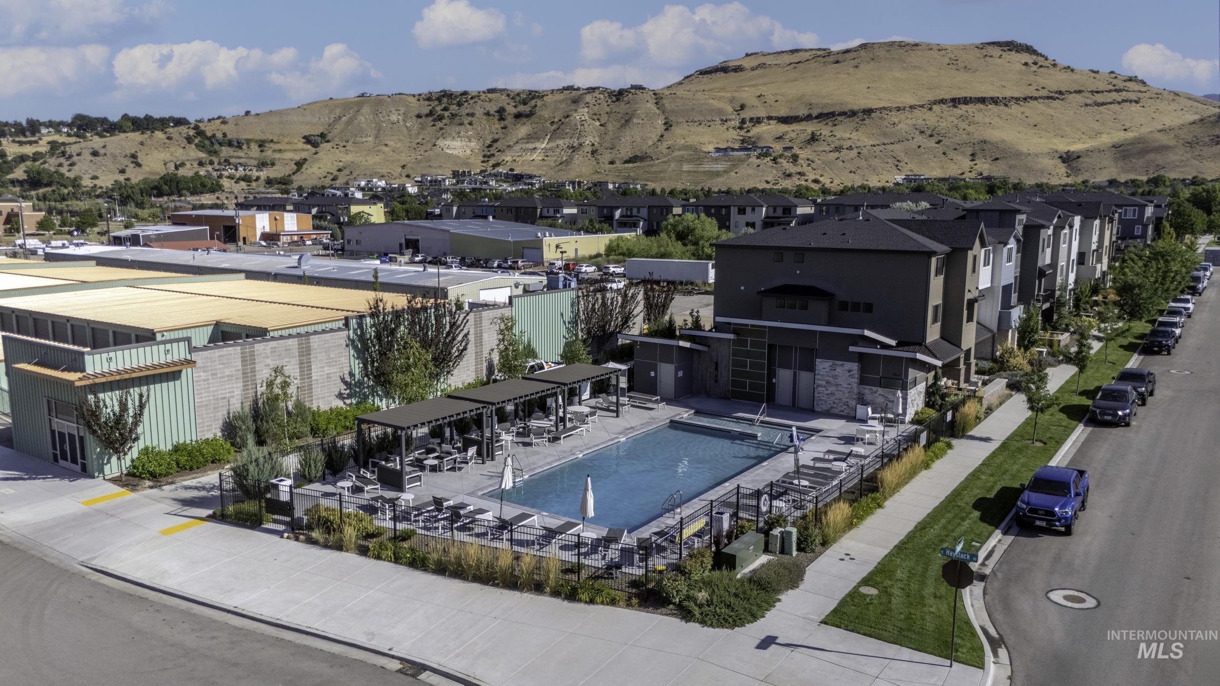 4340 East Haystack Street, Unit 307 Boise, ID 83716 - Photo 23 of 50 View of pool featuring a mountain view and a residential view