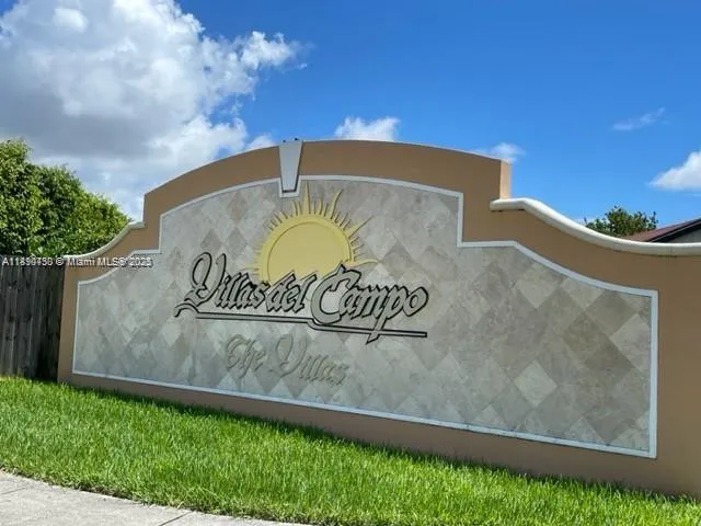 a sign that is on the side of a building