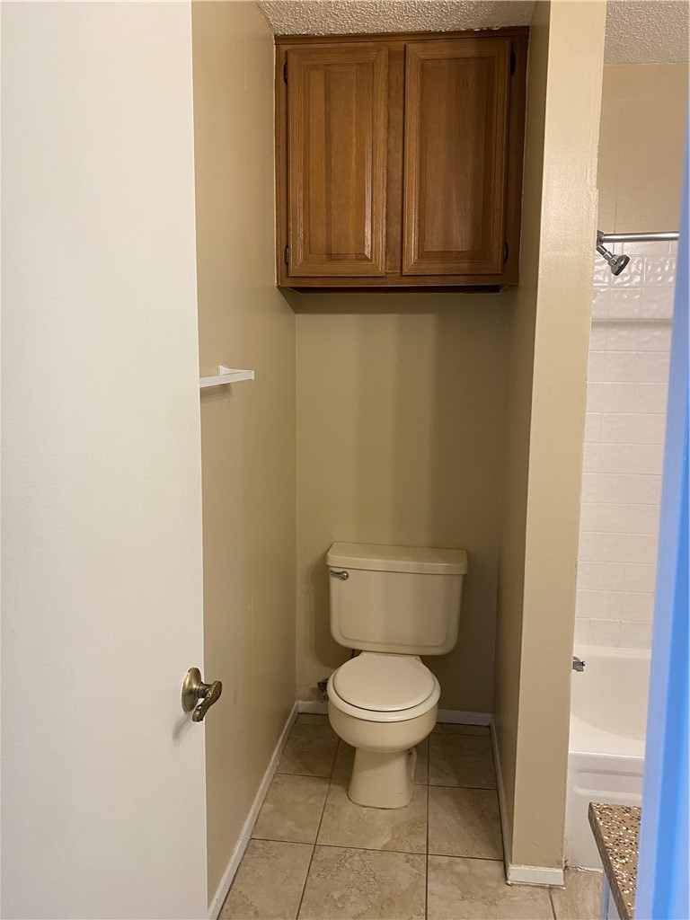 806 West 24th Street, Unit 308 Austin, TX 78705 - Photo 12 of 25 a bathroom with a toilet