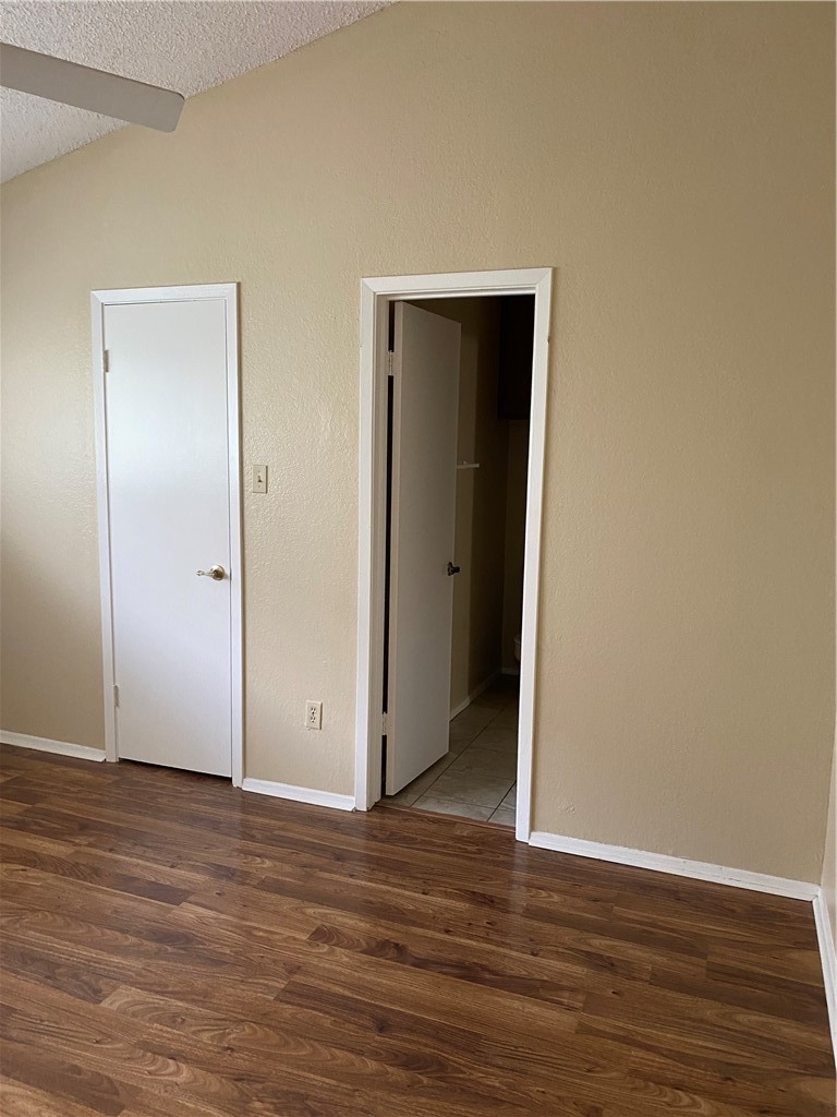 806 West 24th Street, Unit 308 Austin, TX 78705 - Photo 19 of 25 a view of an empty room with wooden floor and closet