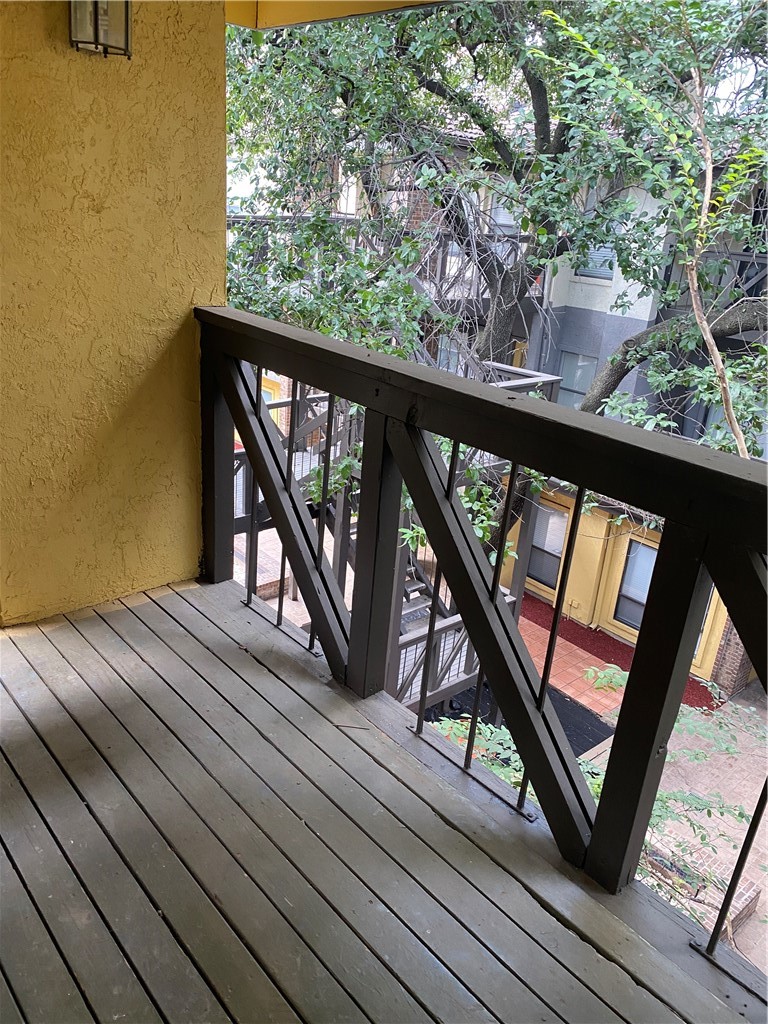 806 West 24th Street, Unit 308 Austin, TX 78705 - Photo 23 of 25 a view of balcony and wooden floor