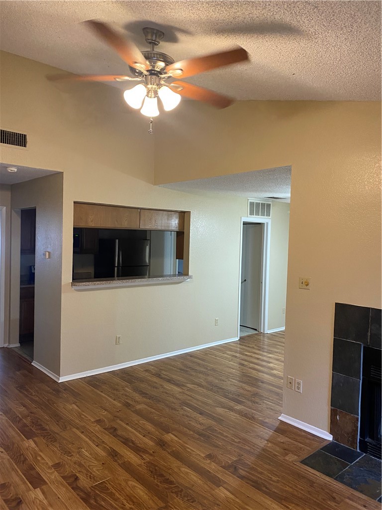 806 West 24th Street, Unit 308 Austin, TX 78705 - Photo 3 of 25 a view of an empty room with wooden floor