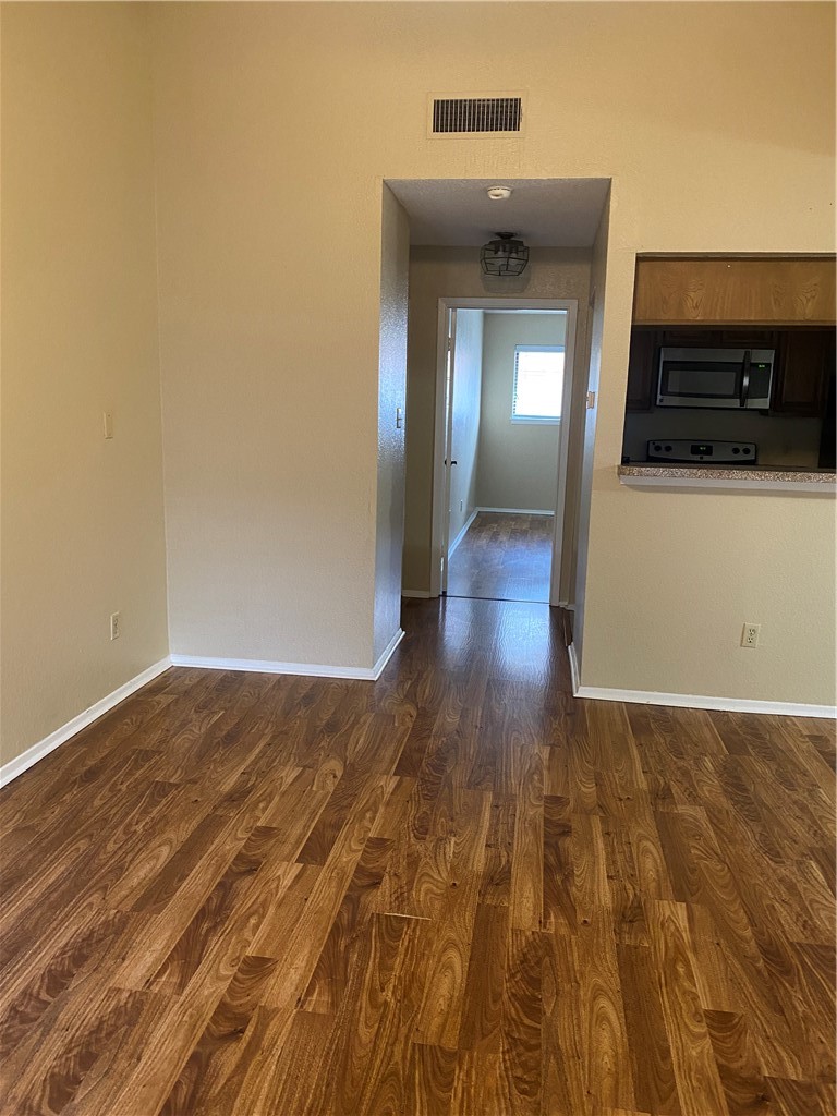 806 West 24th Street, Unit 308 Austin, TX 78705 - Photo 4 of 25 a view of a kitchen from the hallway