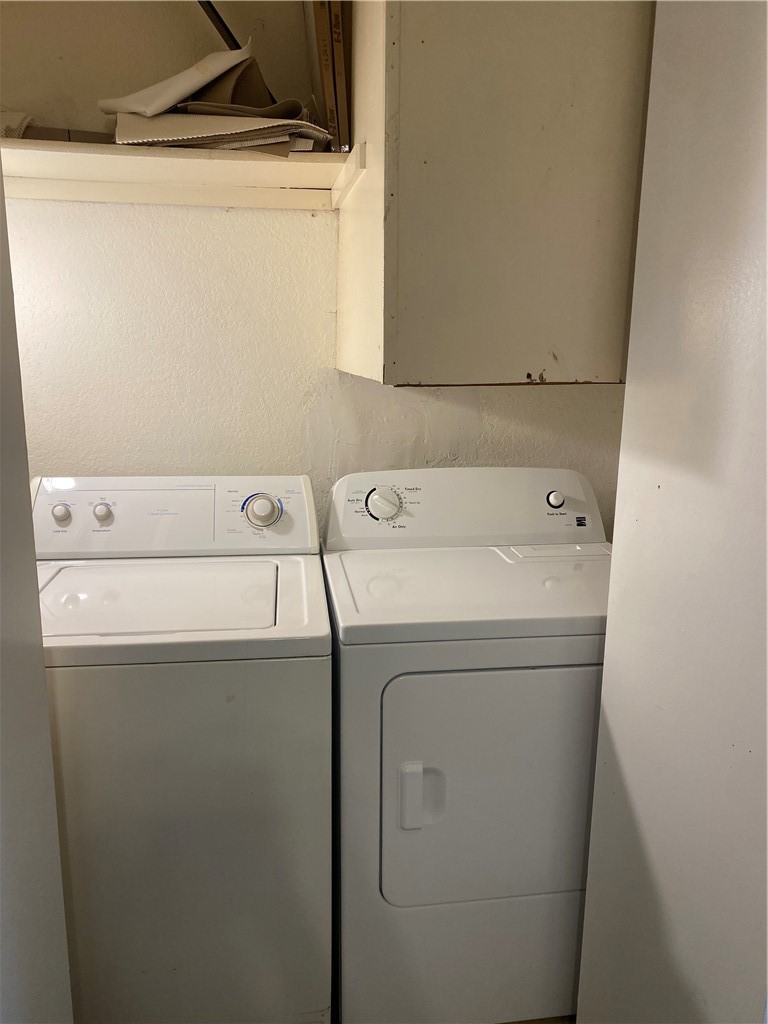 806 West 24th Street, Unit 308 Austin, TX 78705 - Photo 9 of 25 a utility room with dryer and washer