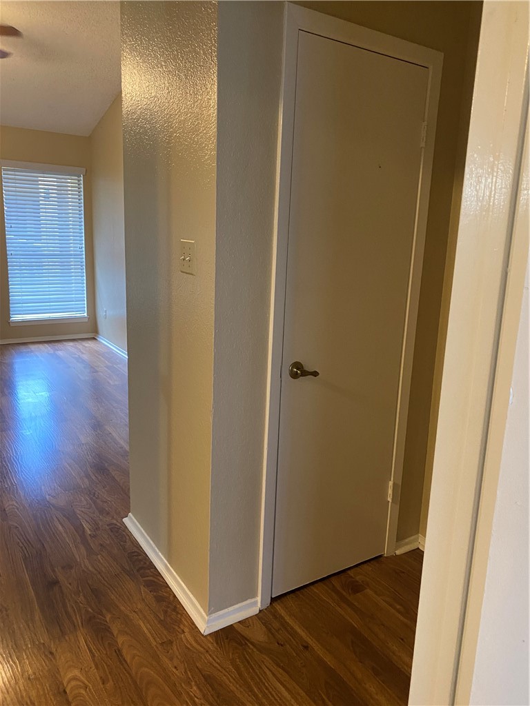 806 West 24th Street, Unit 308 Austin, TX 78705 - Photo 10 of 25 a view of a hallway with wooden floor