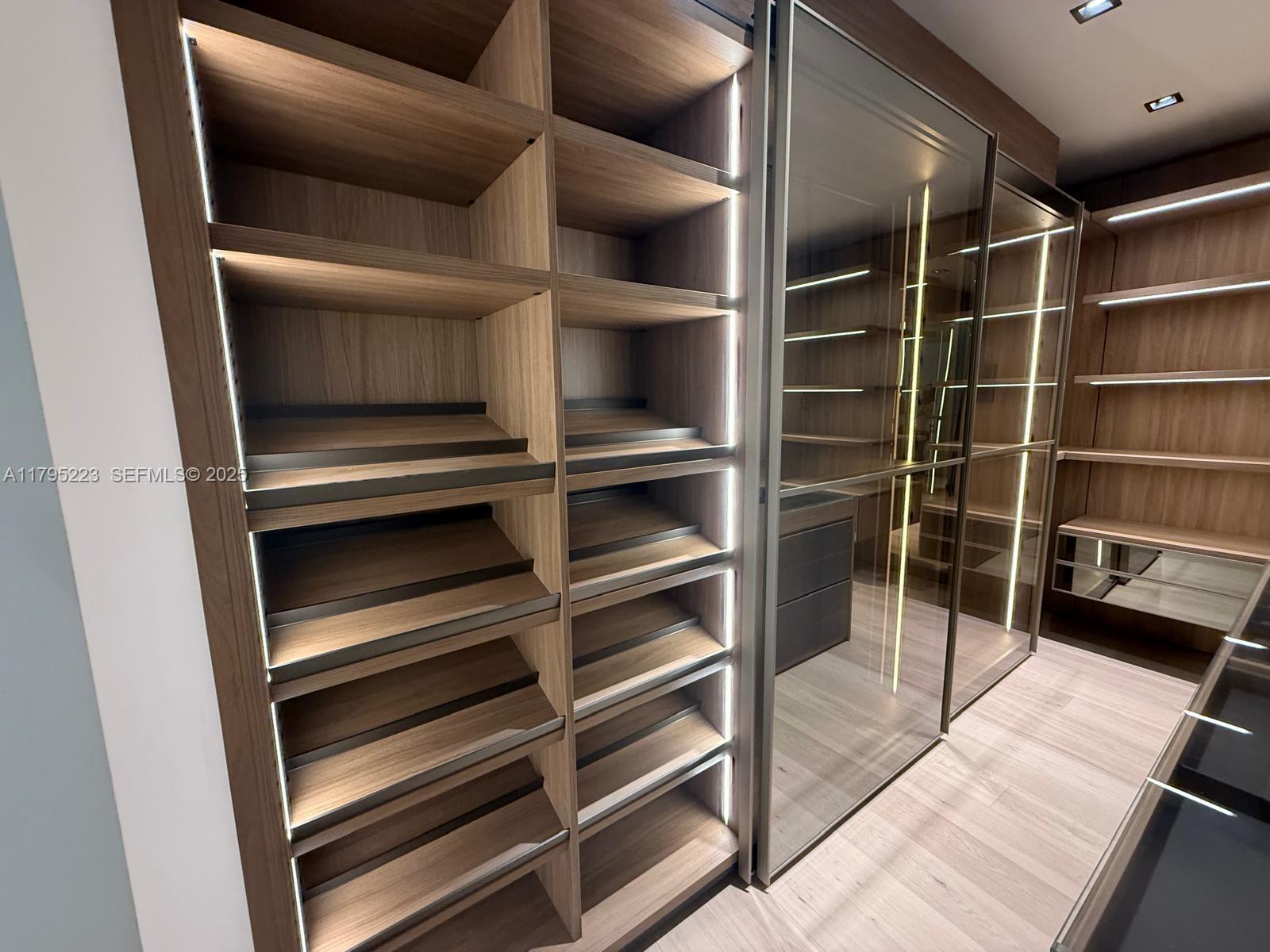 125 Southwest 29th Road Miami, FL 33129 - Photo 30 of 44 a view of walk in closet with empty racks