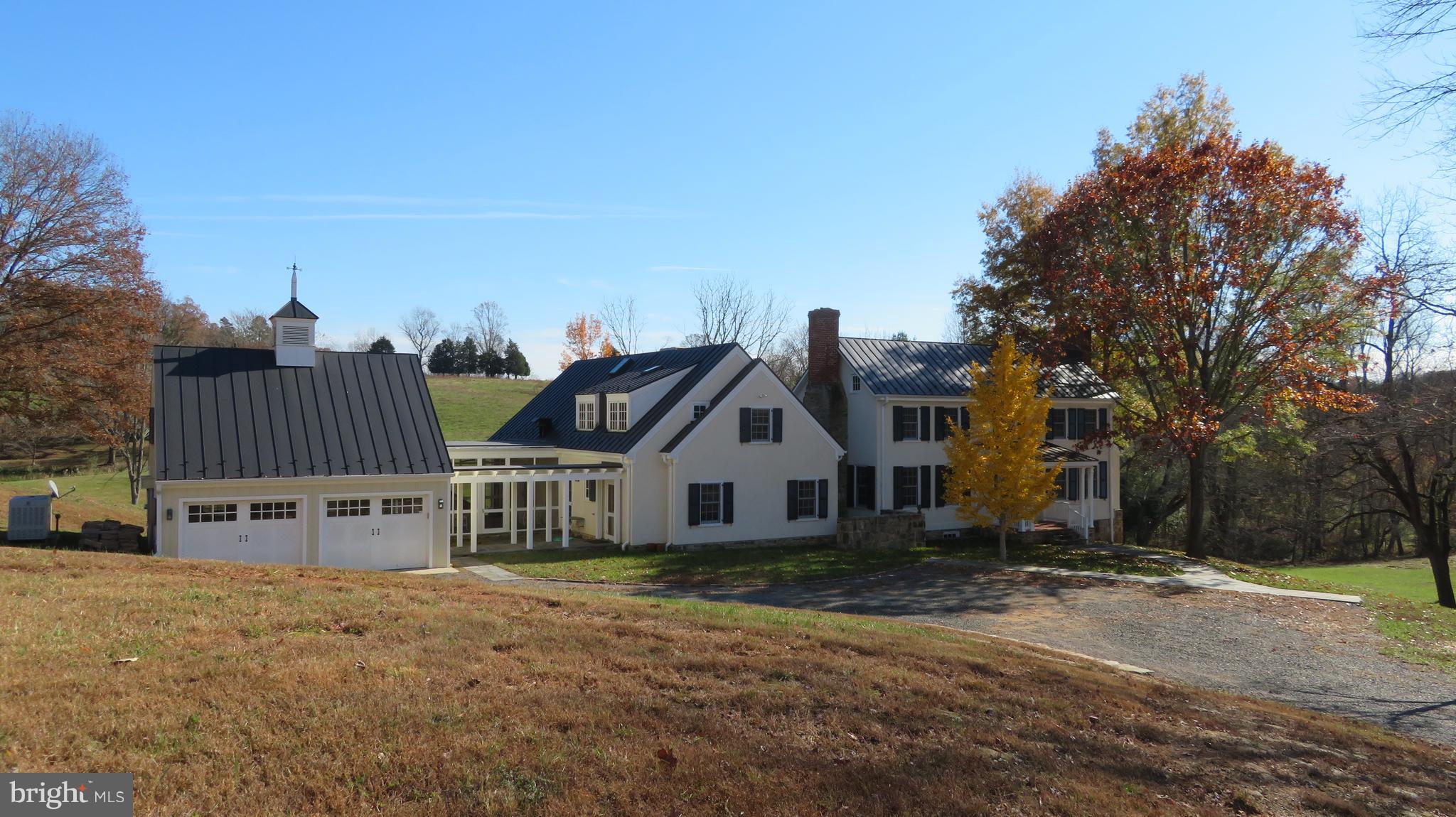 62 Hope Hill Road Castleton, VA 22716 - Photo 3 of 80 a view of a house with a yard and garage
