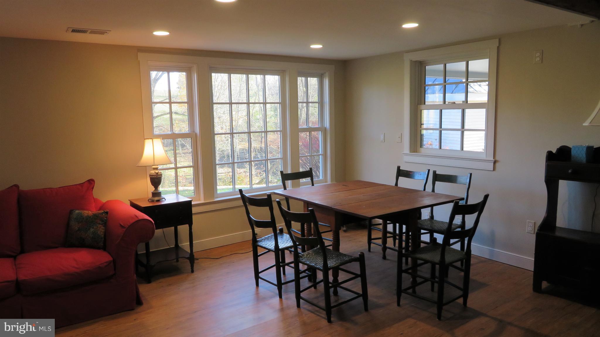 62 Hope Hill Road Castleton, VA 22716 - Photo 48 of 80 a view of a dining room with furniture and wooden floor