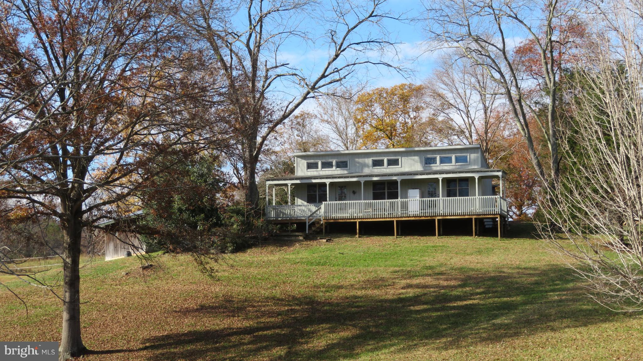 62 Hope Hill Road Castleton, VA 22716 - Photo 66 of 80 a view of a big yard with large trees