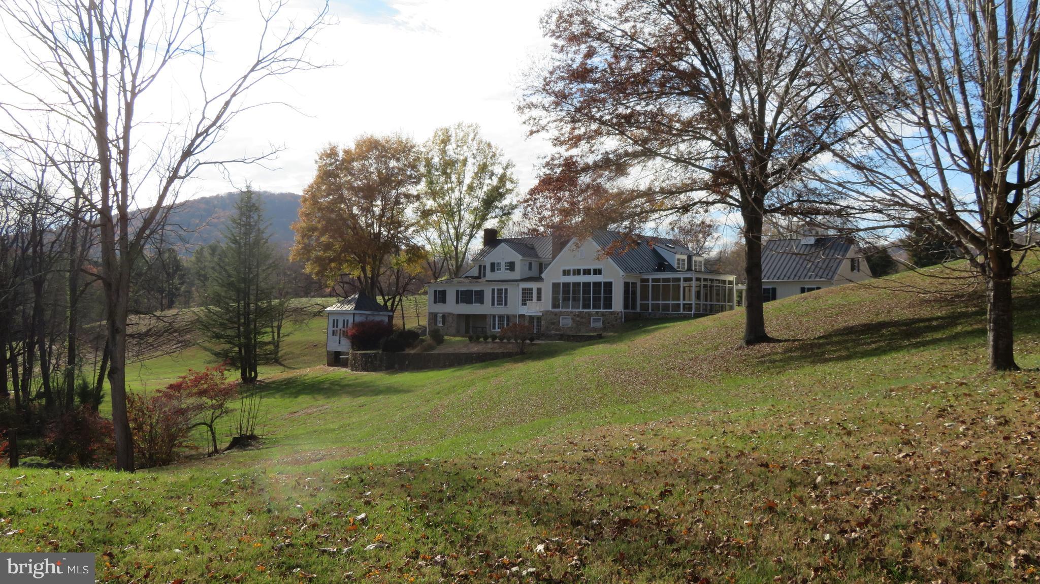 62 Hope Hill Road Castleton, VA 22716 - Photo 68 of 80 View of house from pond