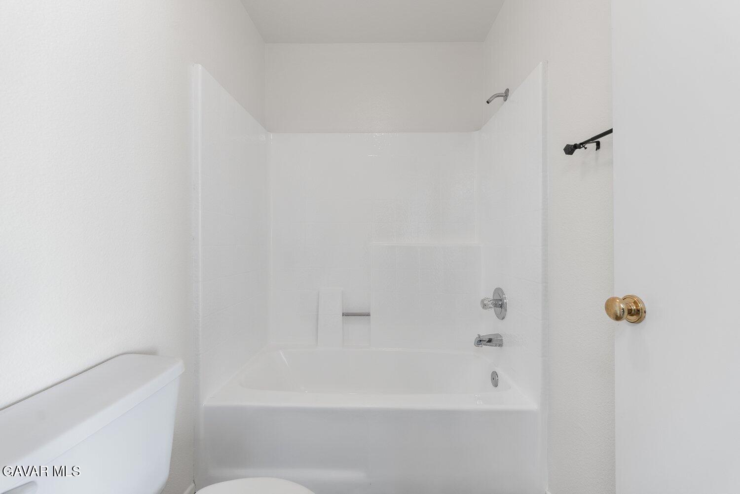 44526 15th Street East, Unit 4 Lancaster, CA 93535 - Photo 34 of 52 a bathroom with a bathtub