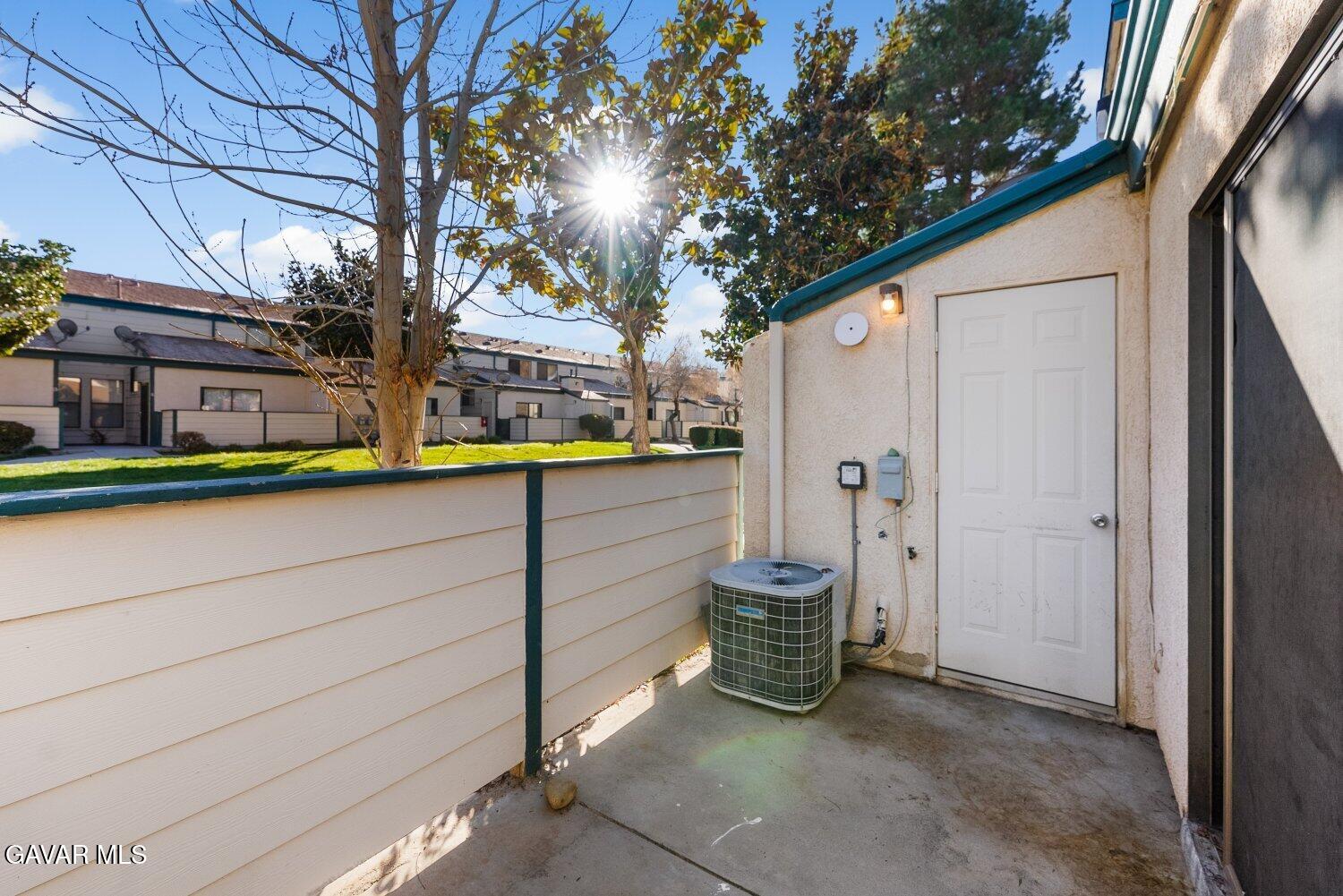 44526 15th Street East, Unit 4 Lancaster, CA 93535 - Photo 37 of 52 a view of a house with a patio